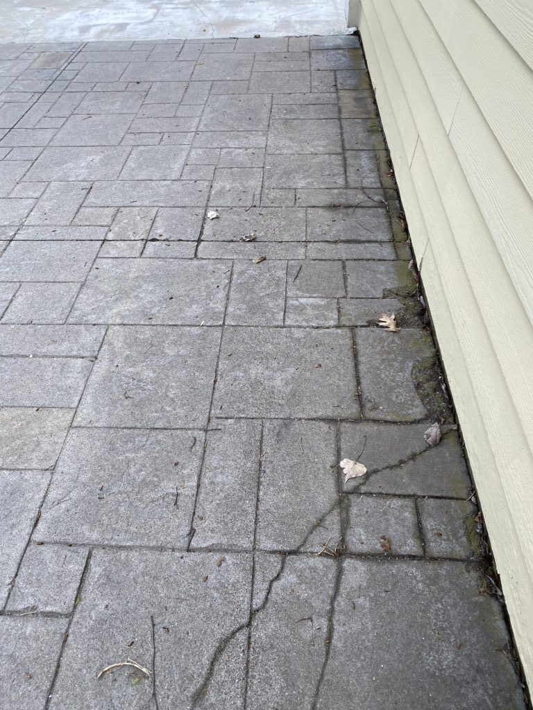 Cracked Foundation - MJT ROOFING Cracked foundation from not having gutters installed. MJT Roofing Gutter Installation in Willimantic, CT.