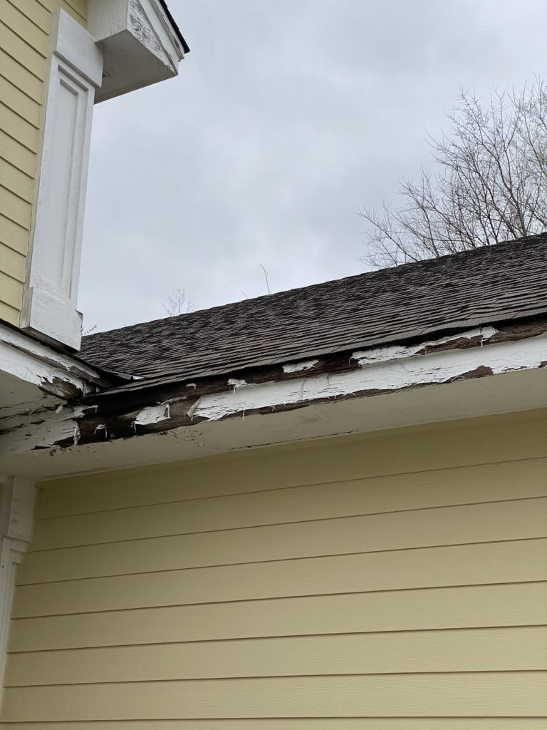 No Gutters - MJT ROOFING Rotting soffit from not having gutters installed. MJT Roofing gutter installation in Willimantic, CT